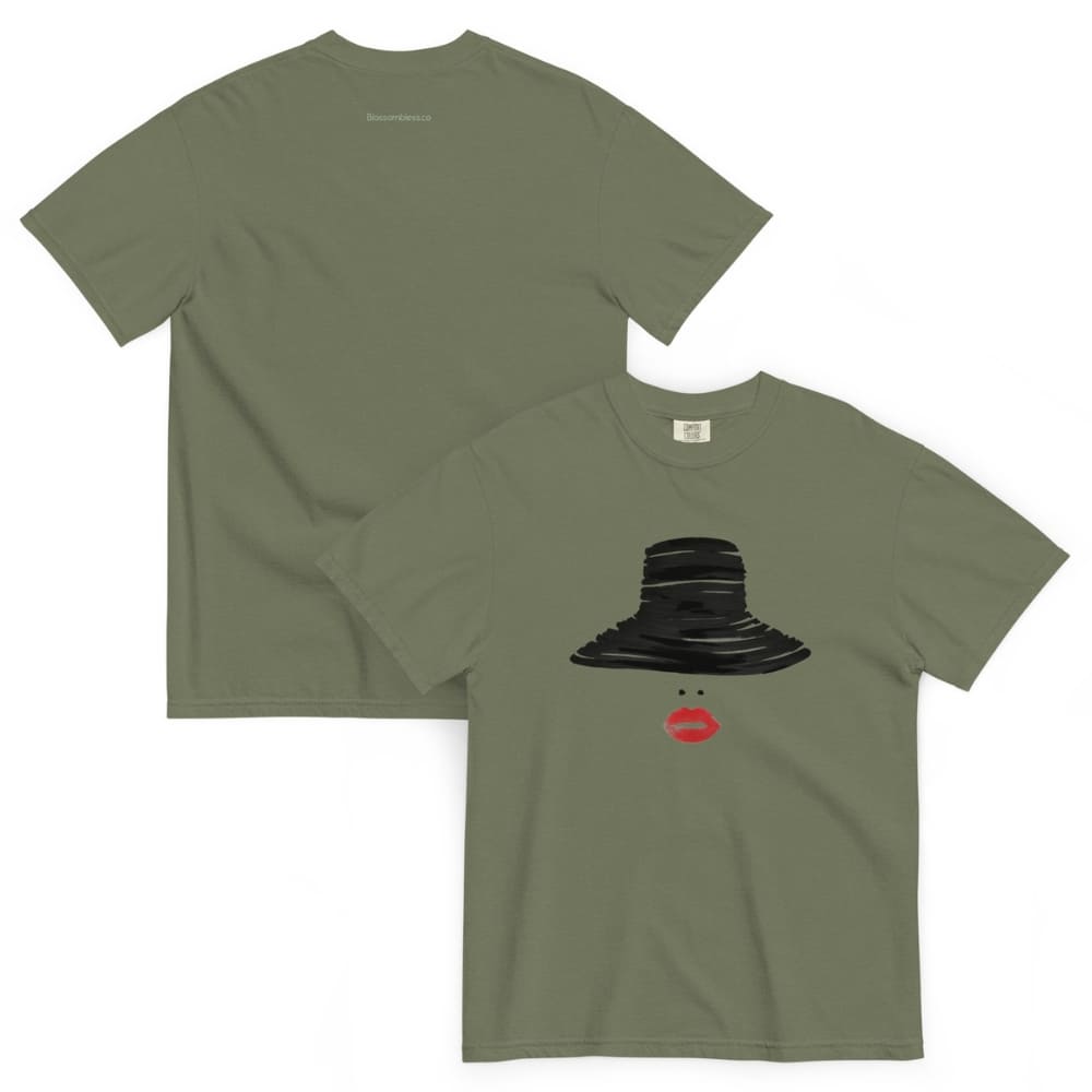Two Moss green t-shirts, one plain and one with a black hat and red mouth graphic.