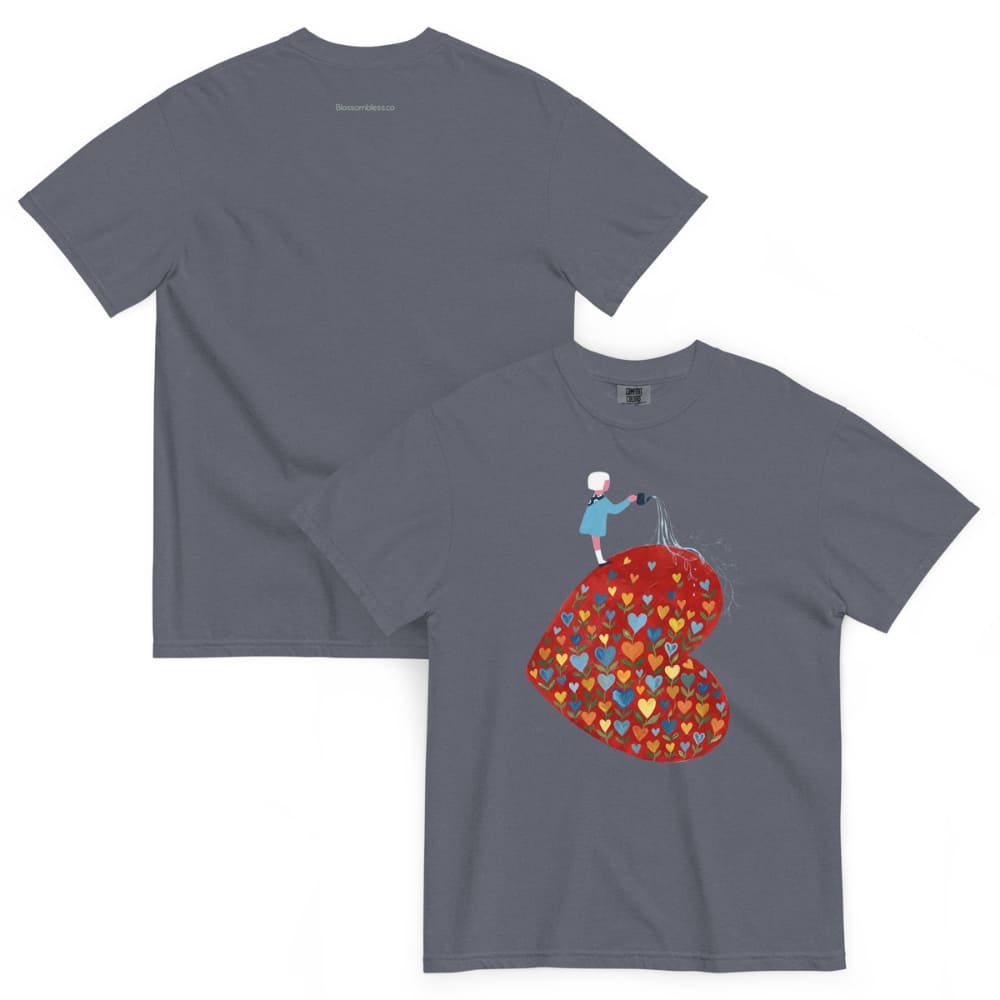 Denim blue t-shirt with a colorful graphic design on a white background