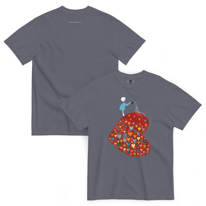 Denim blue t-shirt with a colorful graphic design on a white background