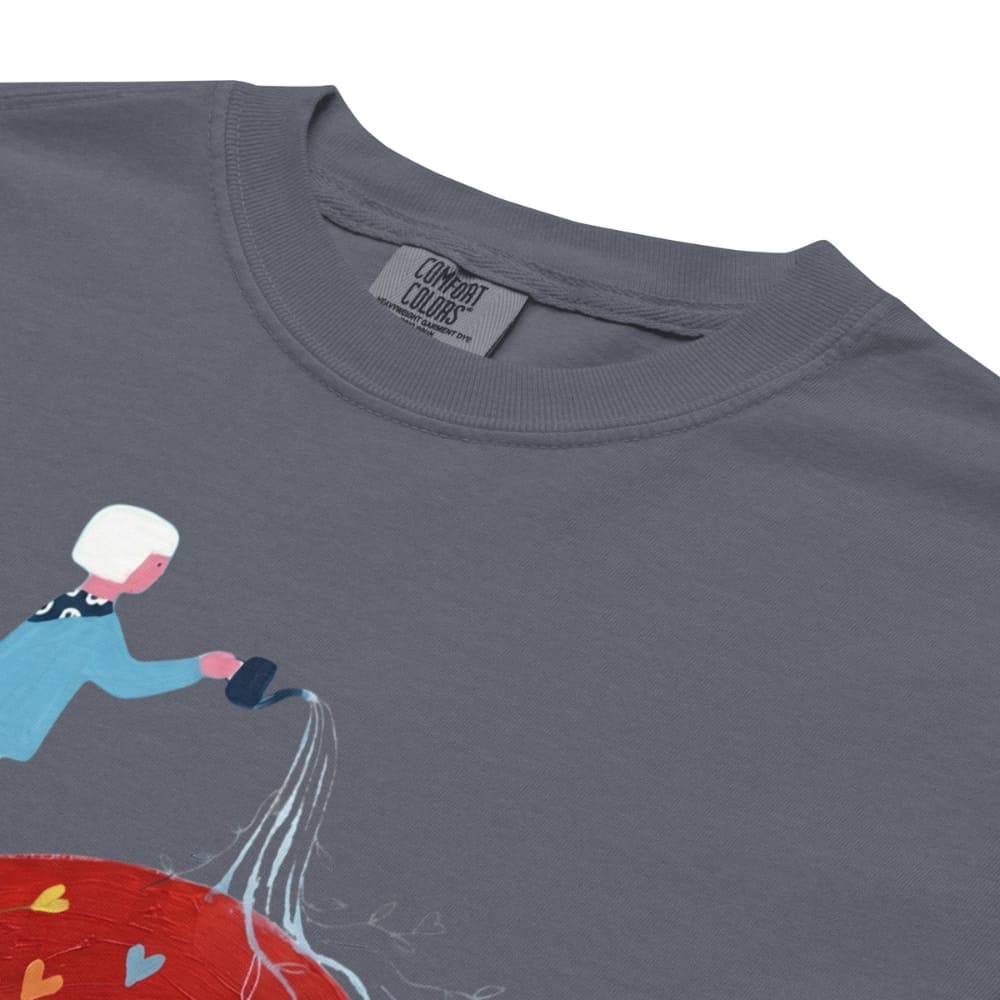 Denim blue t-shirt with a graphic design of a person watering plants, featuring the 'Comfort Colors' brand label.