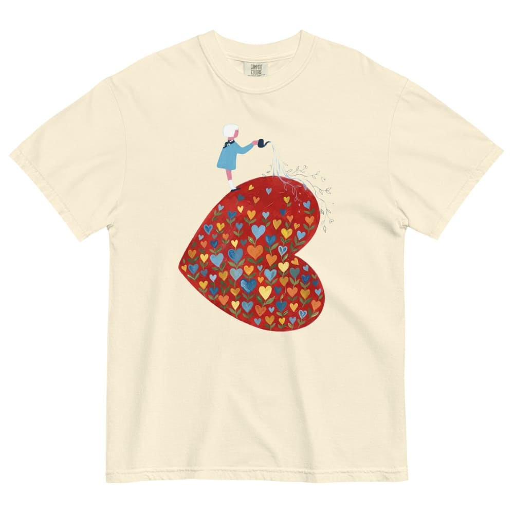 Ivory t-shirt with a colorful heart design and character on a white background