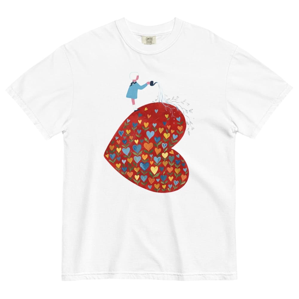 White t-shirt with a colorful heart design and small figure on a white background