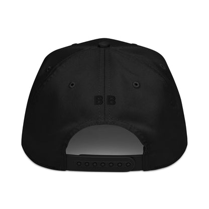 Black cap with a reflective patch on a white background