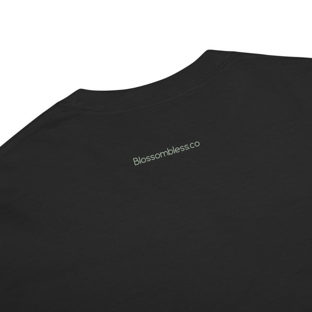Close-up of a black t-shirt on a white background