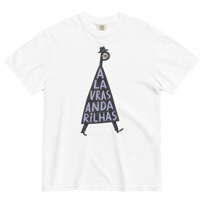 A white short-sleeve crewneck t-shirt featuring a graphic illustration of a walking figure in a black hat and pants, with a triangular body containing the Portuguese text 'A LA VRAS ANDA RILHAS' in purple lettering.