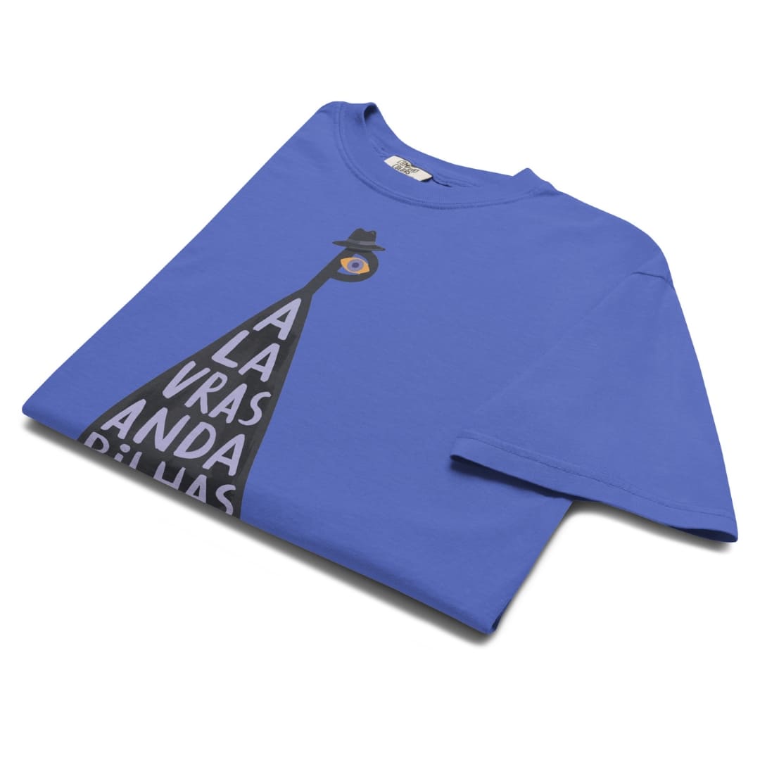 A folded blue short-sleeve t-shirt with a graphic print of a streetlamp and the text 'A LA VRAS ANDA PELLIAS' in white, shown on a white background.