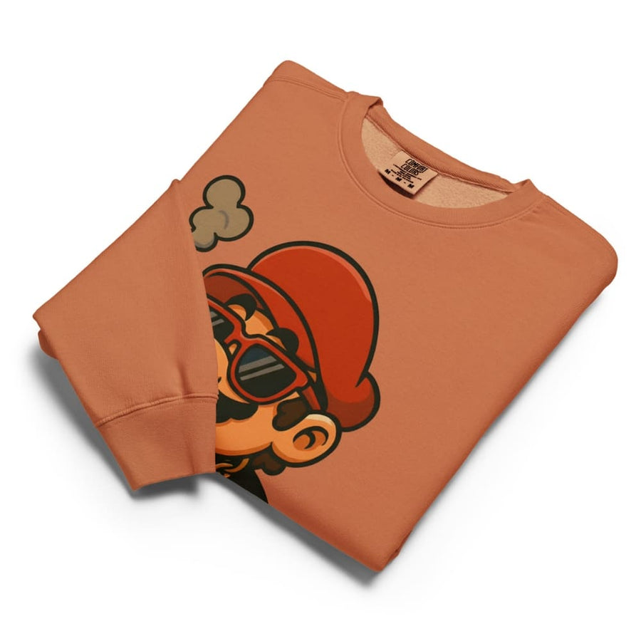 Folded brown sweatshirt with graphic design on a white background