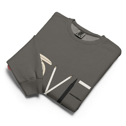 Folded gray sweatshirt with pencil design on a white background