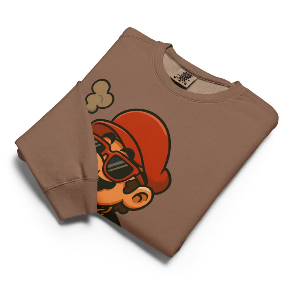 Folded brown sweatshirt with a graphic design on a white background