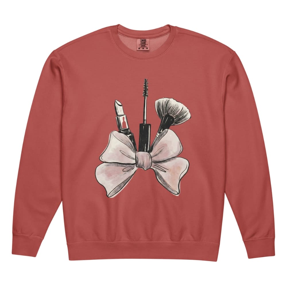 Red sweatshirt with makeup and bow design on a white background