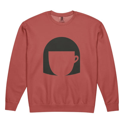 Red sweatshirt with a black graphic of a face on a white background