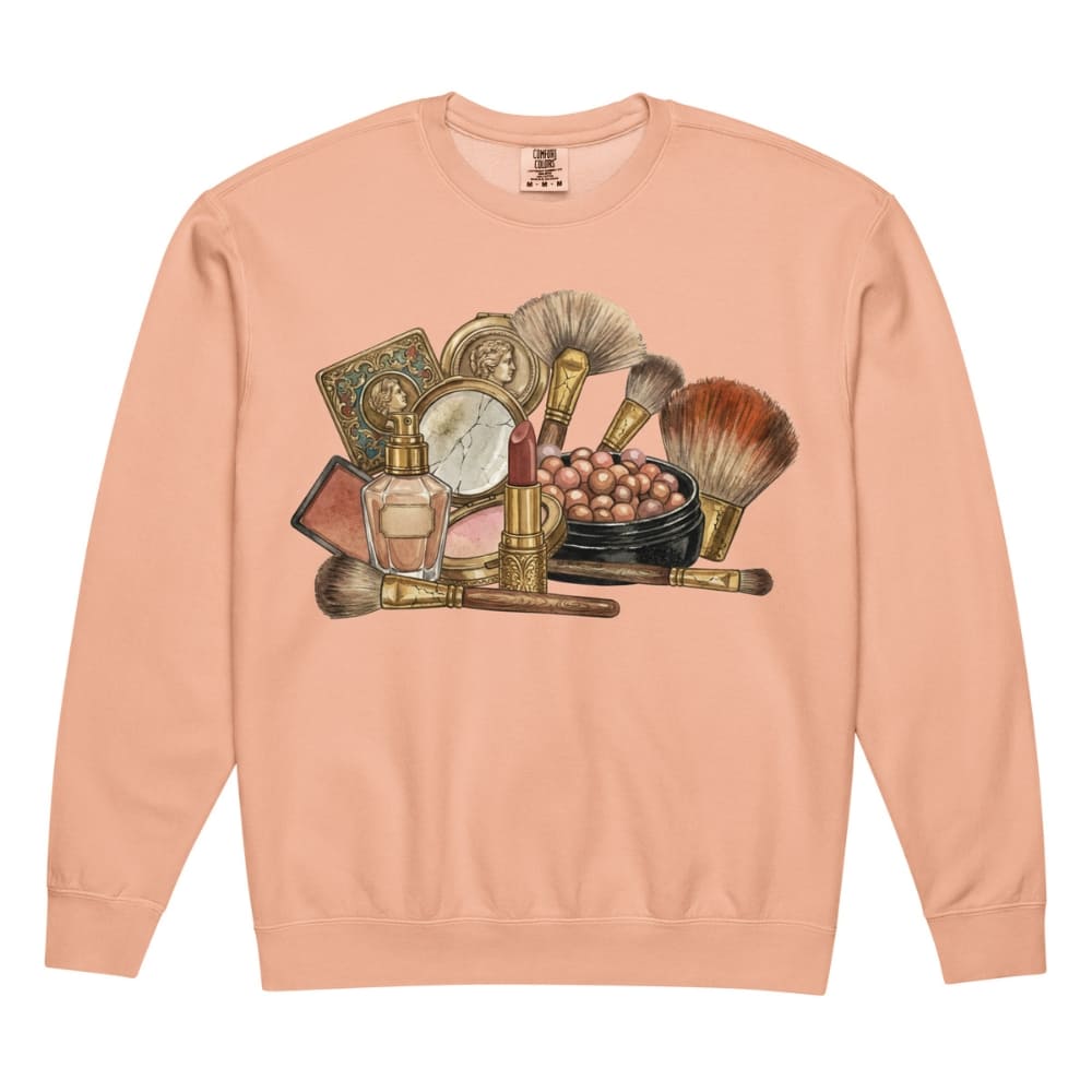 Peach sweatshirt with vintage makeup brush and product illustration on a white background