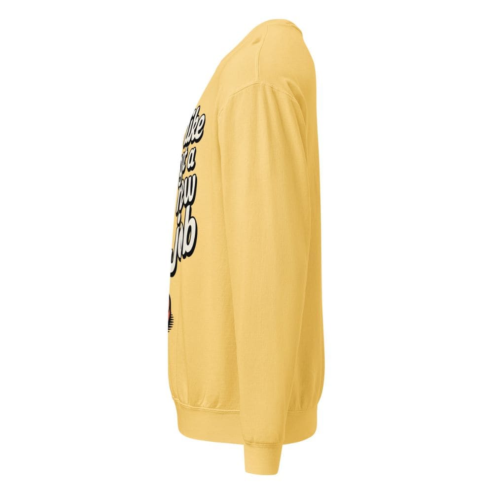 Yellow sweatshirt with text on the sleeve against a white background