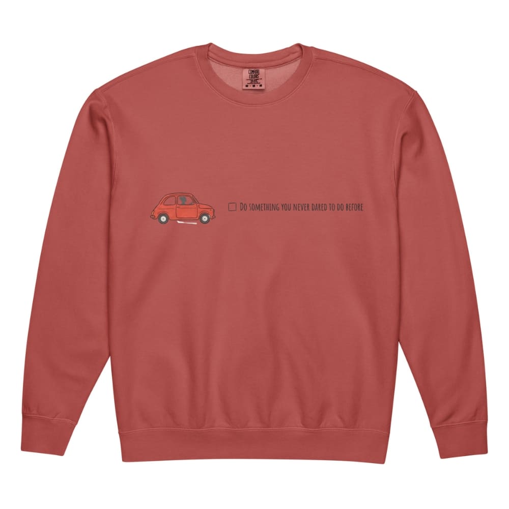 Red sweatshirt with a small graphic and text on a white background