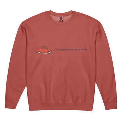 Red sweatshirt with a small graphic and text on a white background