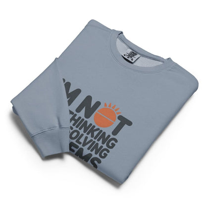 Folded light blue sweatshirt with text and logo on a white background