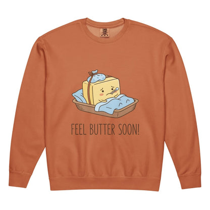 Orange sweatshirt with a cartoon butter character and 'Feel Butter Soon!' text on a white background