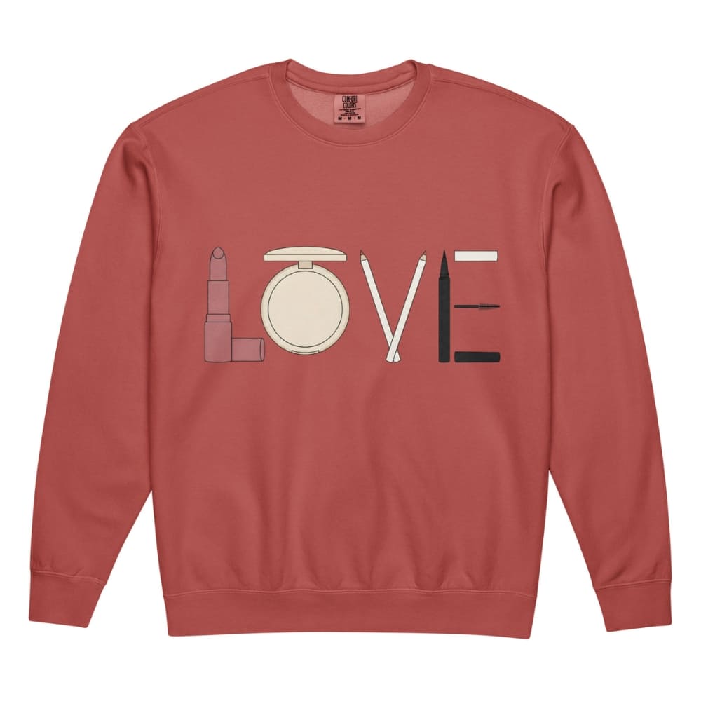 Red sweatshirt with 'LOVE' design using makeup icons on a white background