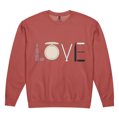 Red sweatshirt with 'LOVE' design using makeup icons on a white background