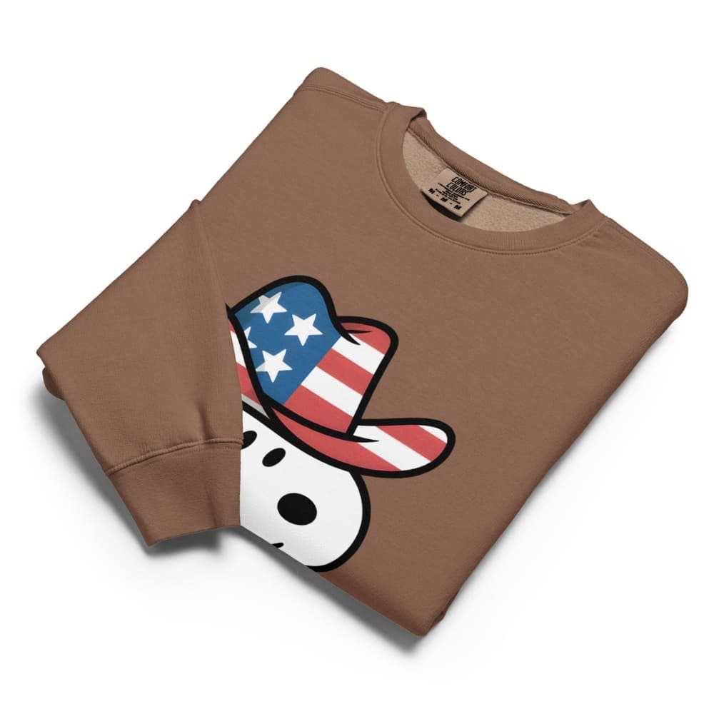 Brown sweatshirt with a graphic of a dog wearing an American flag hat on a white background