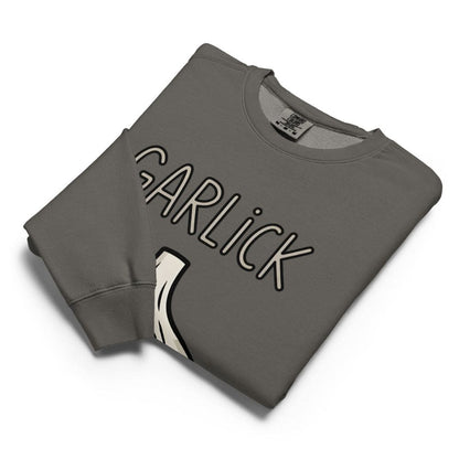 Folded gray sweatshirt with 'GARLICK' text on a white background