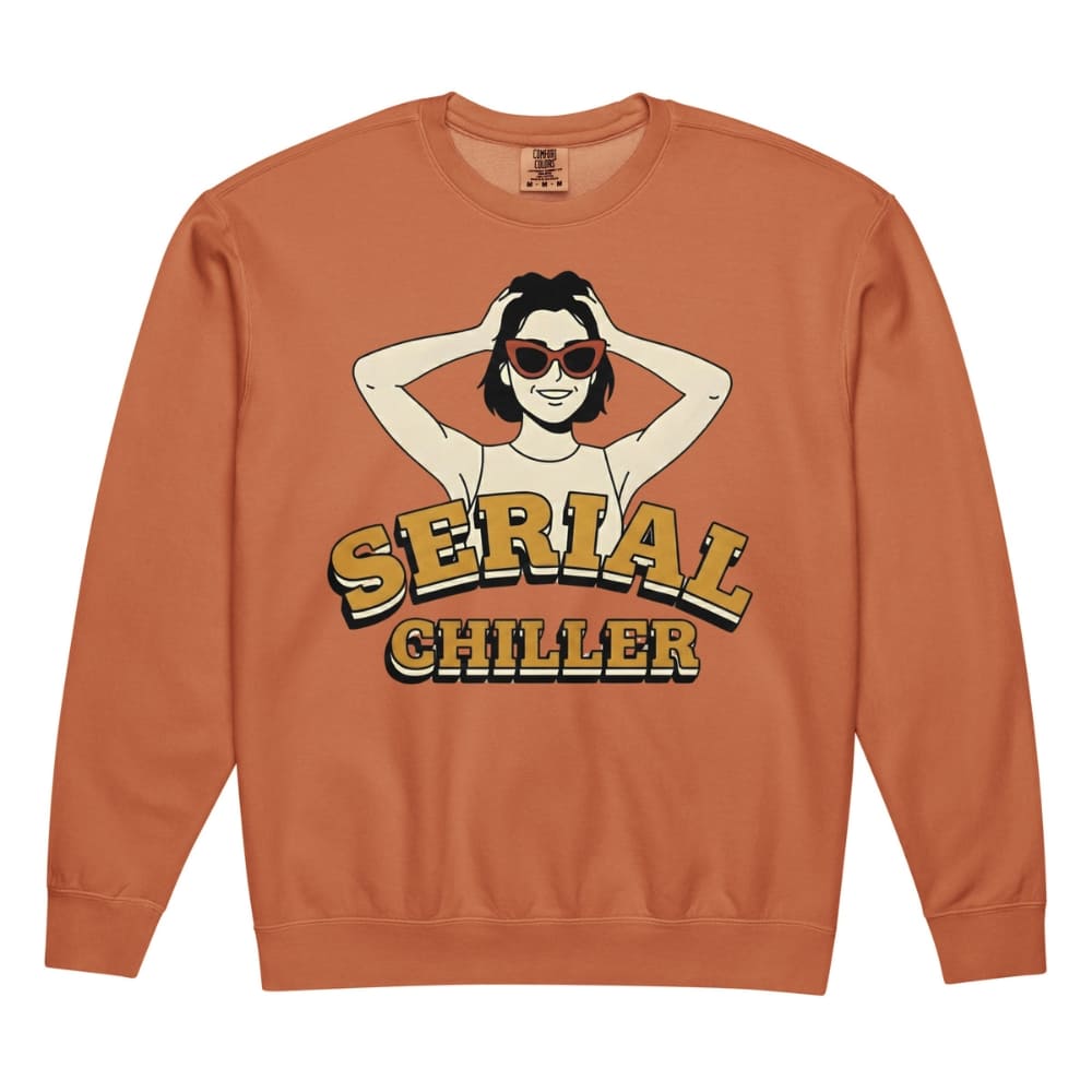 Orange sweatshirt with graphic design and 'Serial Chiller' text on a white background