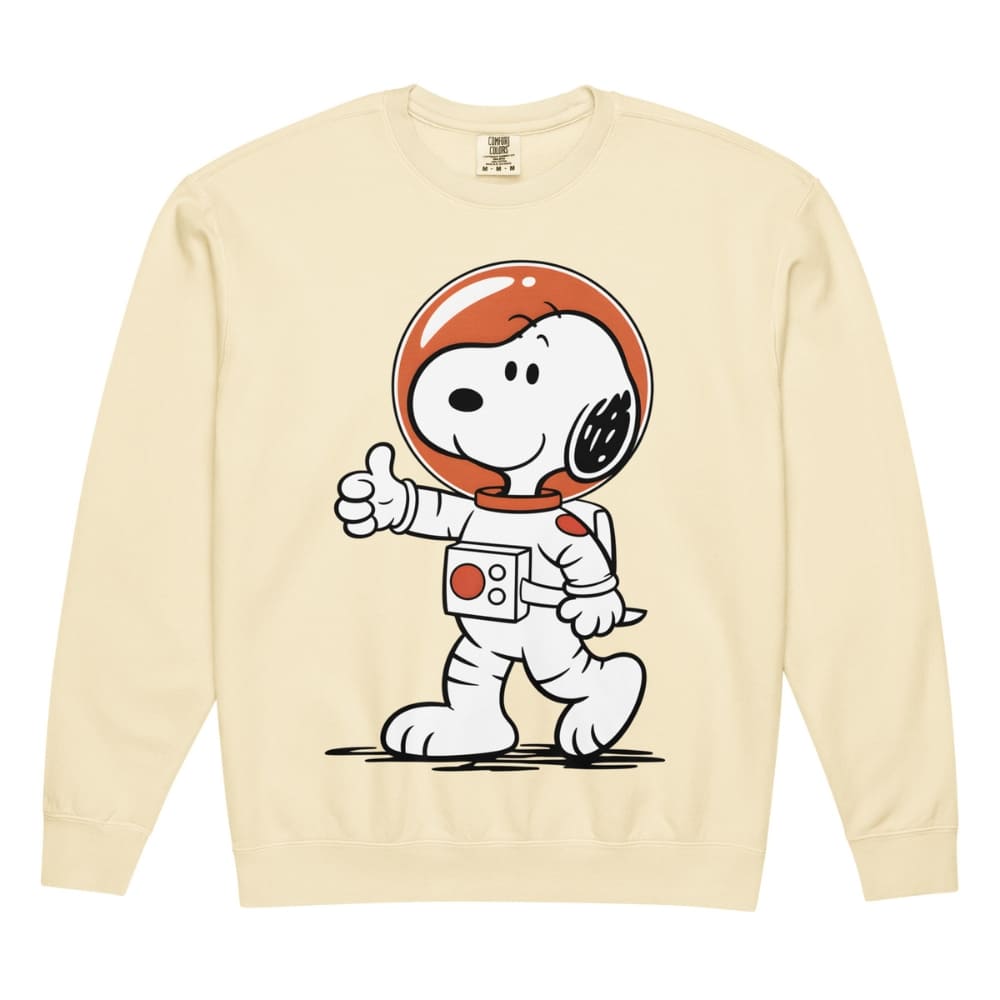 Snoopy in an astronaut suit on a beige sweatshirt