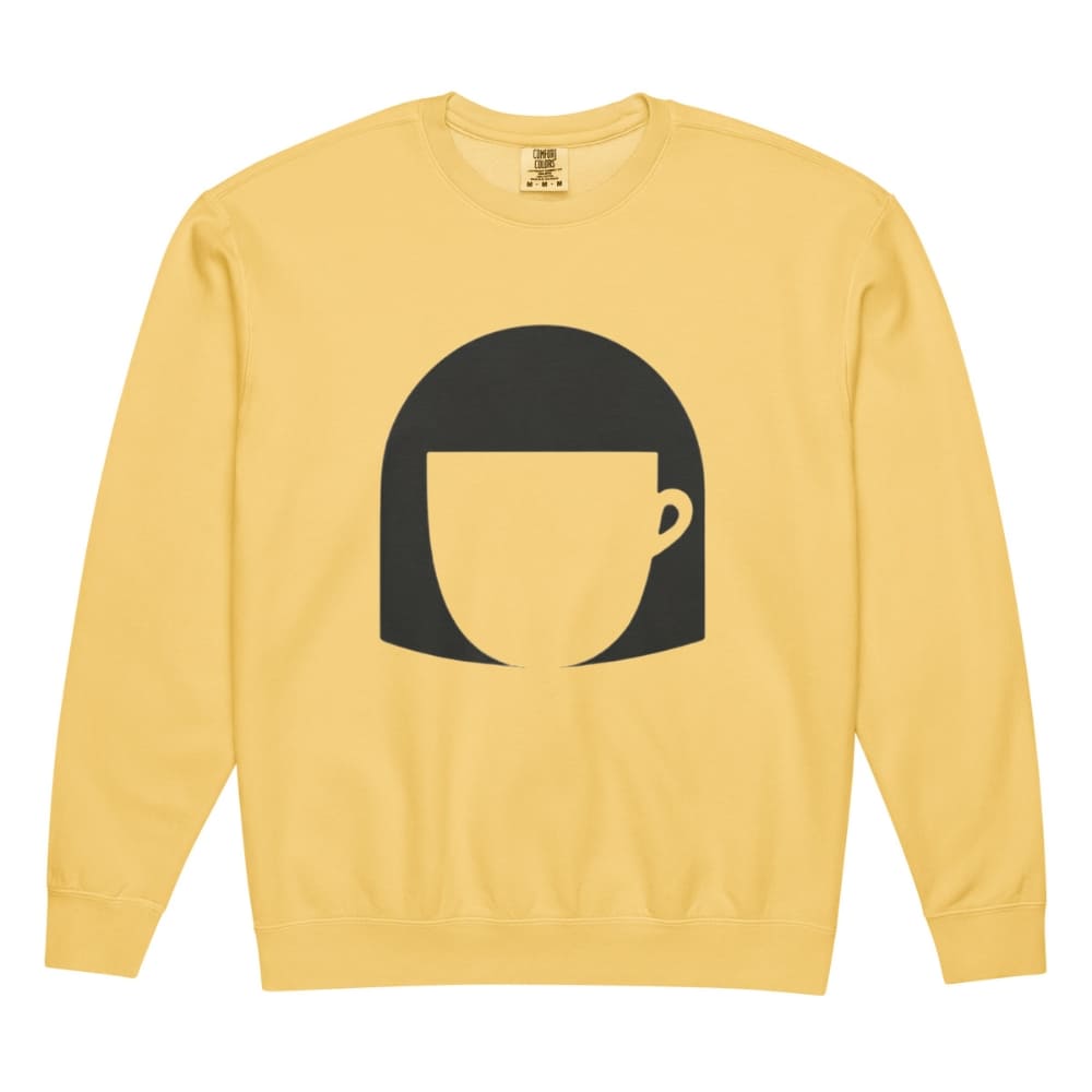 Yellow sweatshirt with a black graphic of a face on a white background