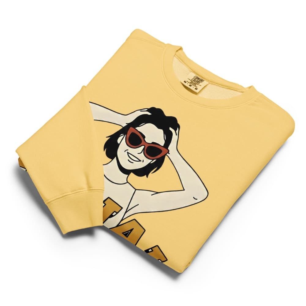 Yellow sweatshirt with a graphic design of a person wearing sunglasses on a white background