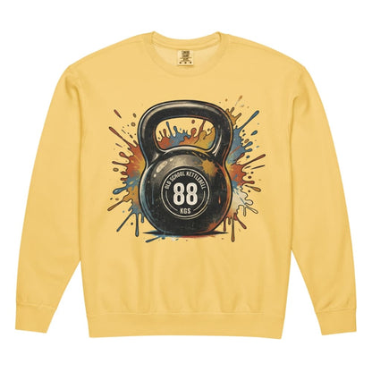 Yellow sweatshirt with a kettlebell graphic on a white background