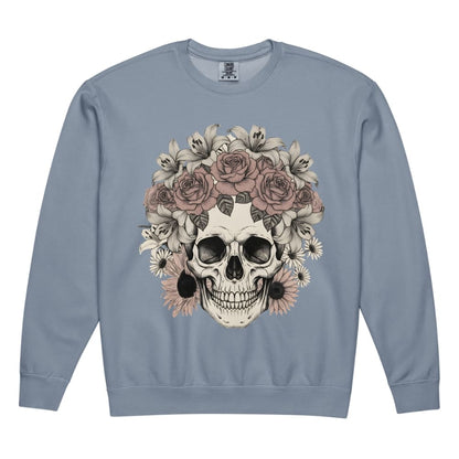 Blue sweatshirt with a skull and floral design on a white background