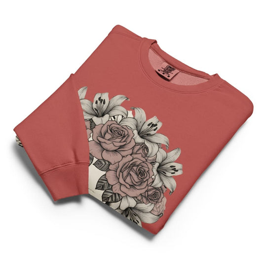Folded red sweatshirt with floral design on a white background