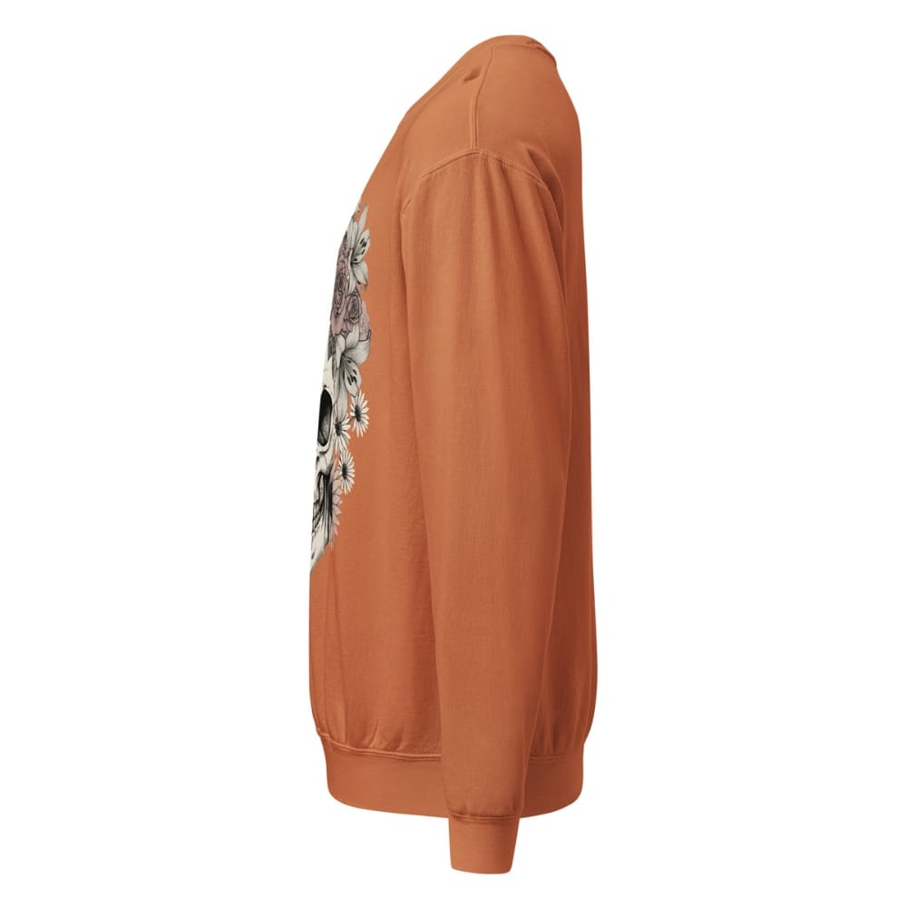 Orange sweatshirt with a floral design on the sleeve against a white background