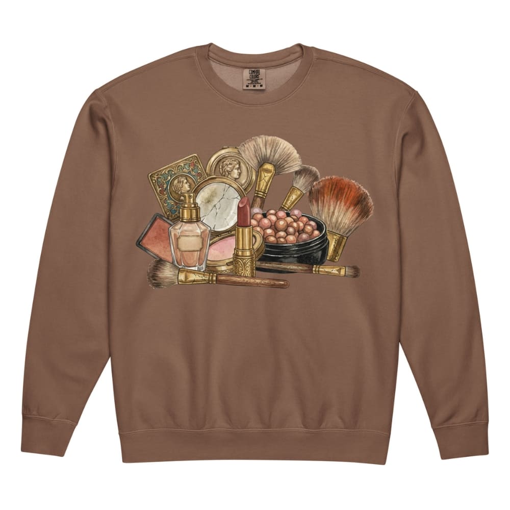 Brown sweatshirt with vintage makeup and perfume graphic on a white background