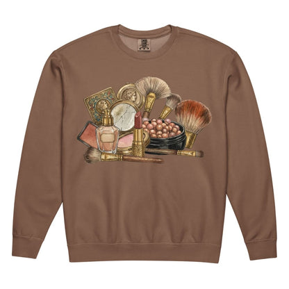 Brown sweatshirt with vintage makeup and perfume graphic on a white background