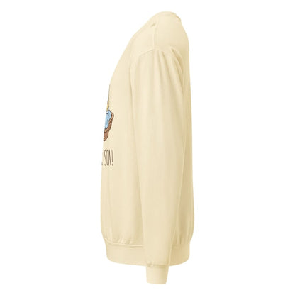 Ivory sweatshirt with a logo and text on the sleeve against a white background