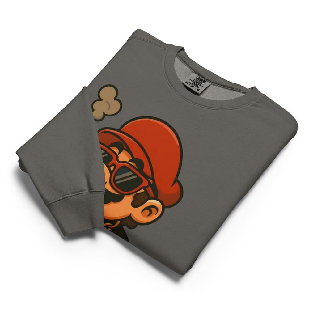 Folded gray sweatshirt with a graphic design on a white background
