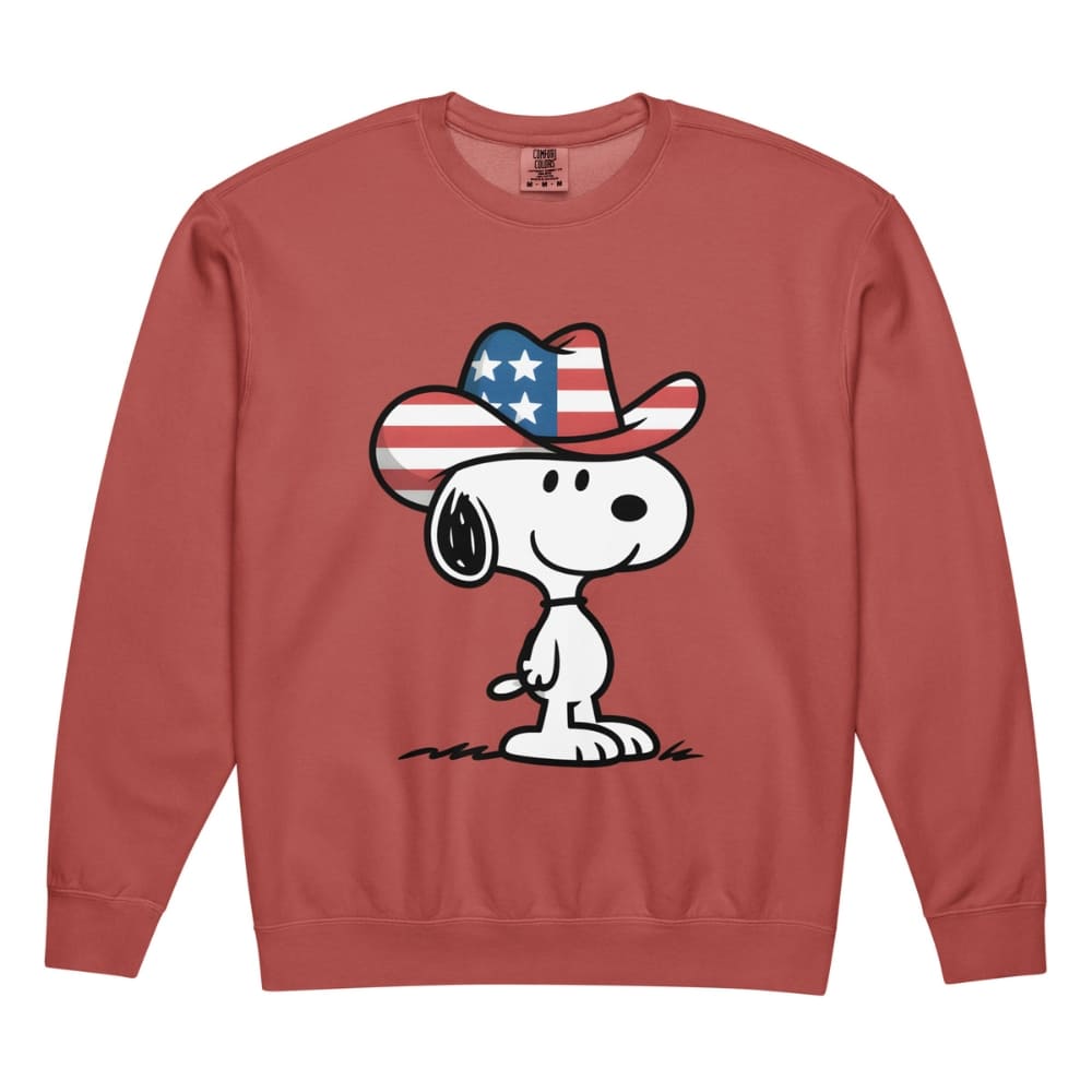 Red sweatshirt with a cartoon dog wearing an American flag cowboy hat on a white background