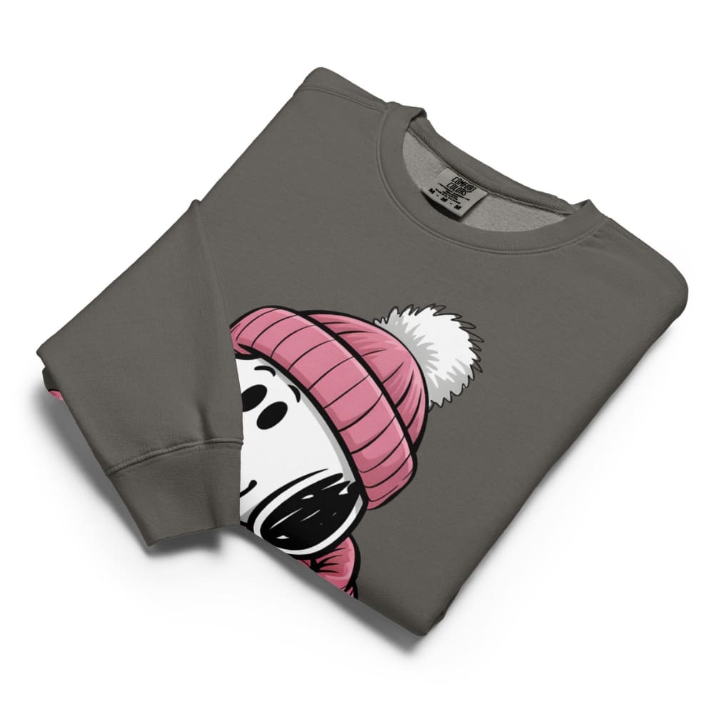 Folded gray sweatshirt with cartoon character wearing a pink beanie on a white background