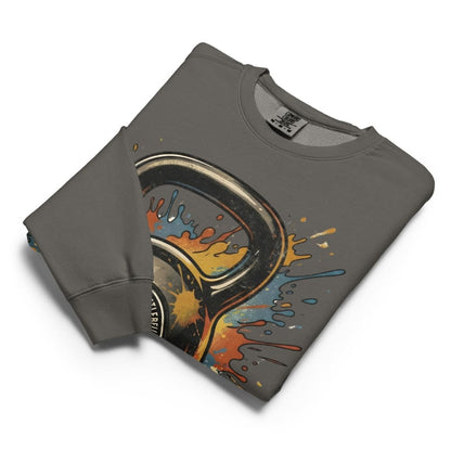 Folded gray sweatshirt with colorful graphic design on a white background