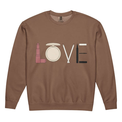 Brown sweatshirt with 'LOVE' spelled out using makeup icons on a white background