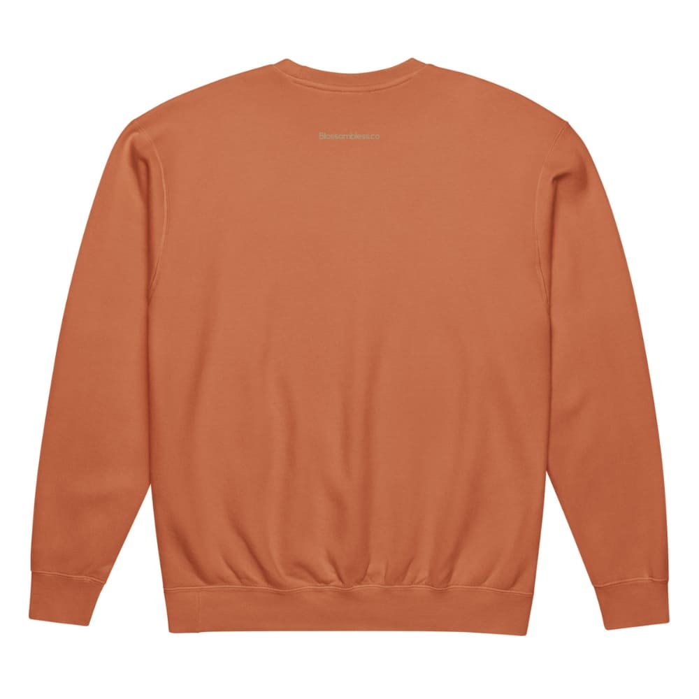Orange sweatshirt on a white background