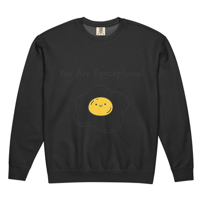 Black sweatshirt with a smiley face egg design on a white background