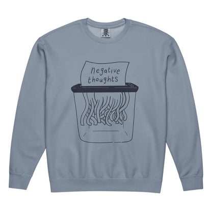 Blue sweatshirt with a graphic of a shredder and 'negative thoughts' text on a white background