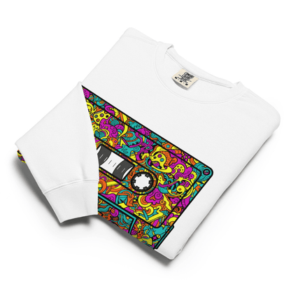 Colorful cassette tape design on a white shirt with a visible brand label.