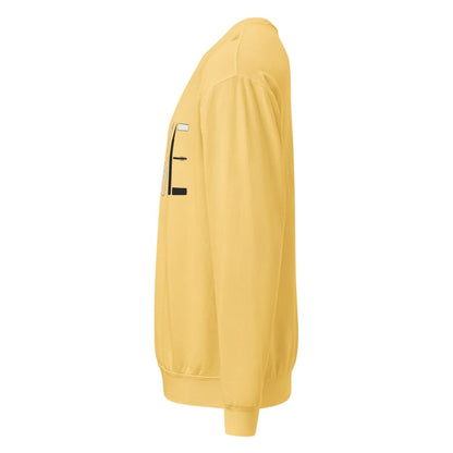 Yellow sweatshirt with a small logo on the chest against a white background