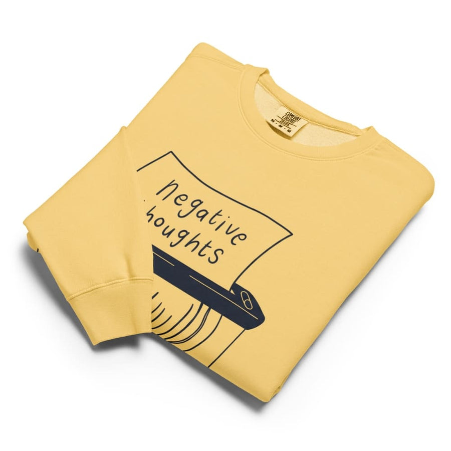 Yellow sweatshirt with 'negative thoughts' graphic on a white background