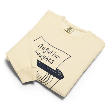 Ivory sweatshirt with 'negative thoughts' graphic on a white background