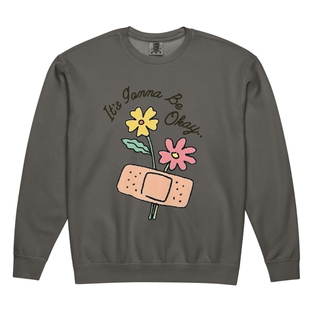 Gray sweatshirt with flowers and bandage graphic and 'It's Gonna Be Okay' text.