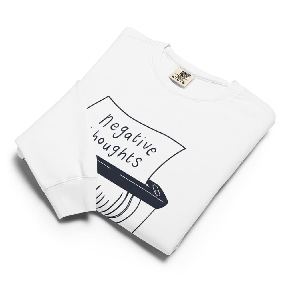 Folded White sweatshirt with 'negative thoughts' graphic.